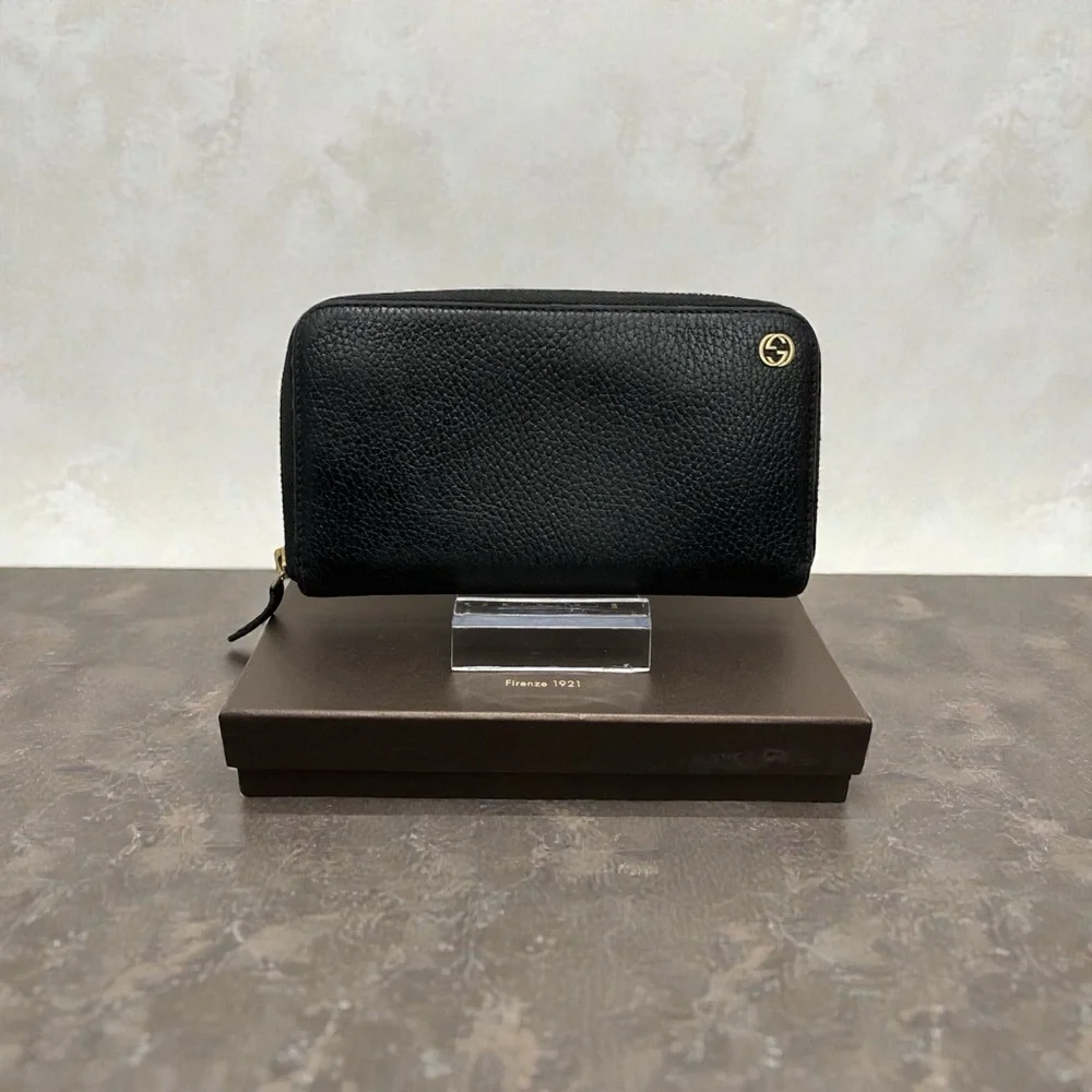 Gucci Black Pebbled Leather Zip Wallet with Gold Logo